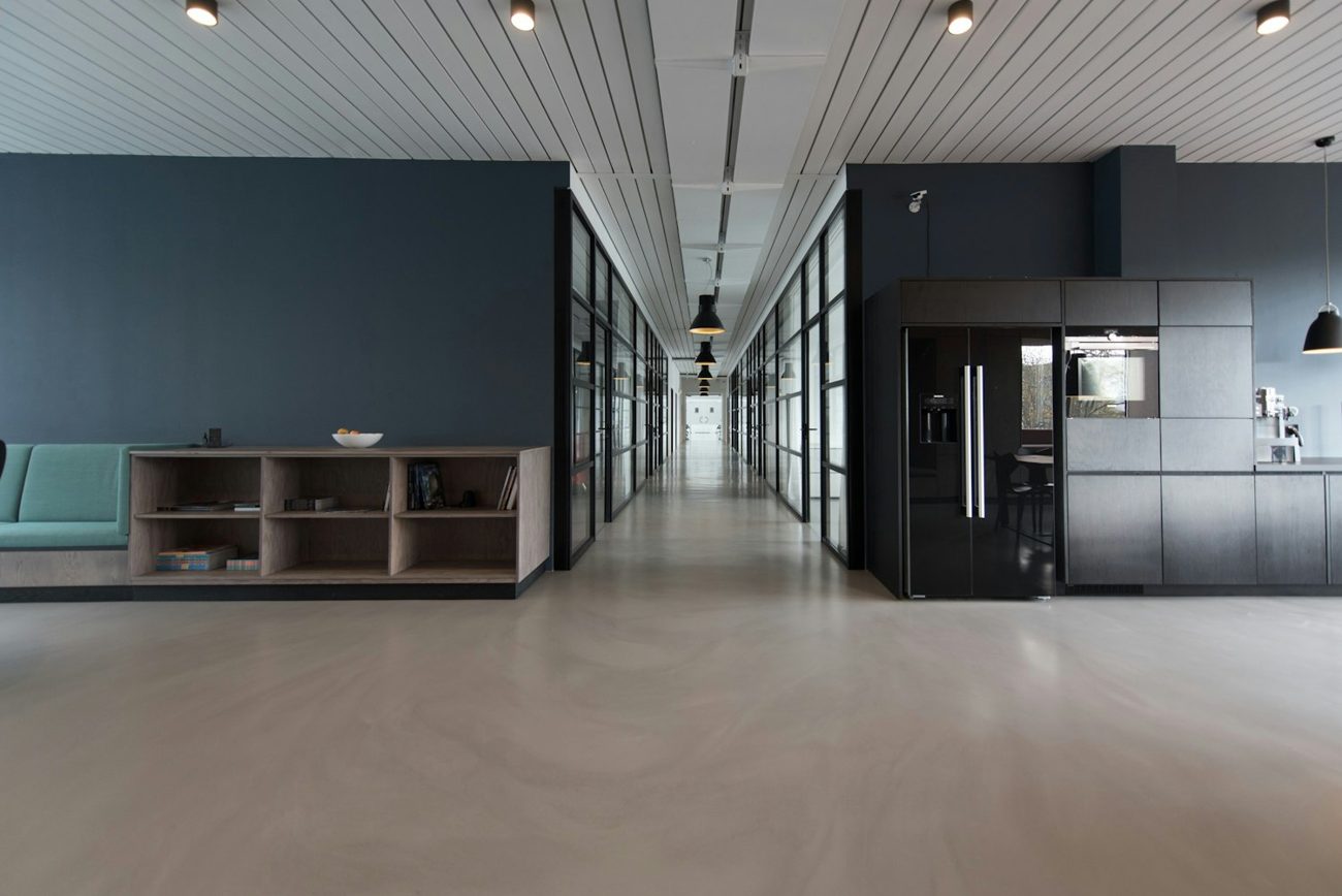 Modern office space lit with SOLID LED downlighting
